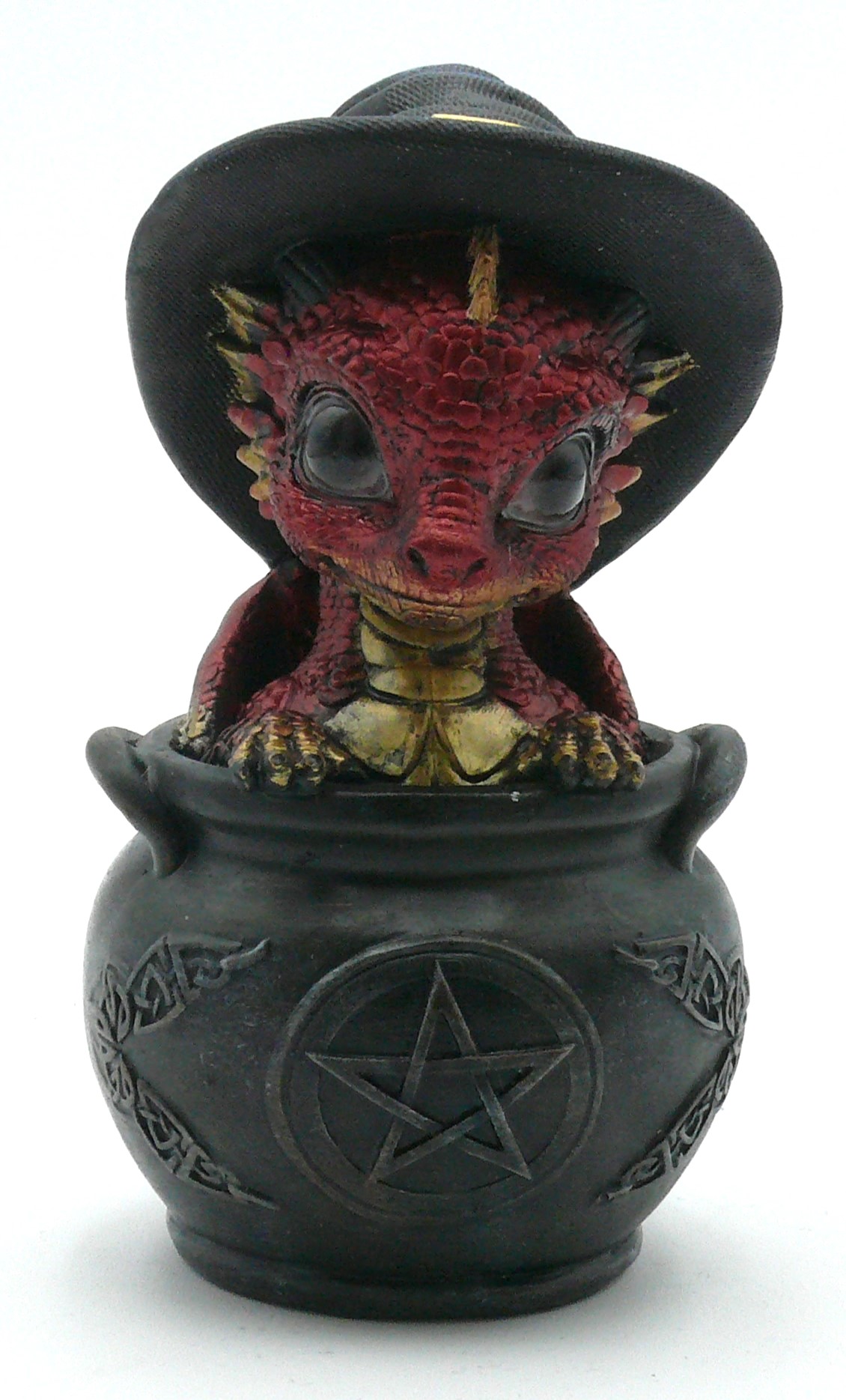 Drache schaut aus Kessel